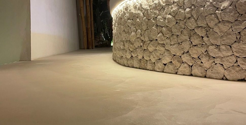 A commercial interior with microcement floors and walls.